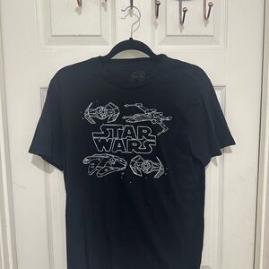 Star Wars graphic tee with Jedi and Sith fighters